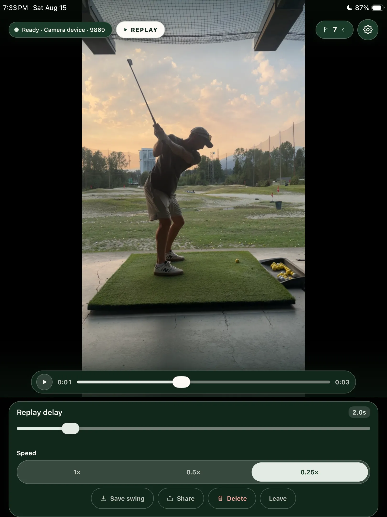 SwingLoop replay screen showing a recorded golf swing with playback, delay, speed, save, and share controls