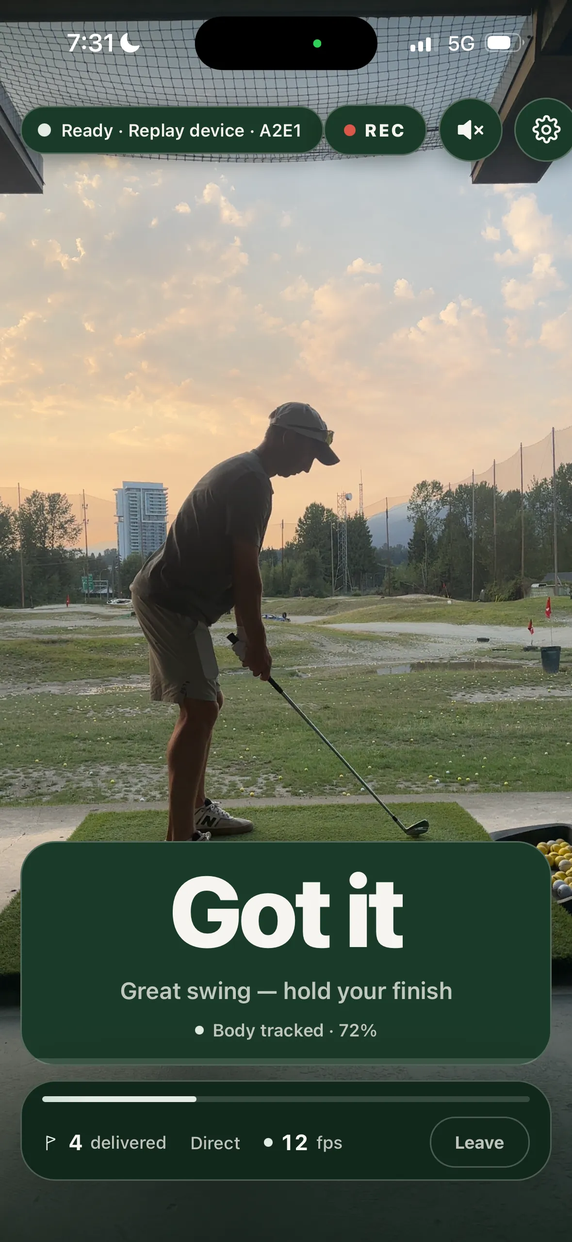 SwingLoop camera screen tracking a golfer at address and confirming the previous swing was delivered